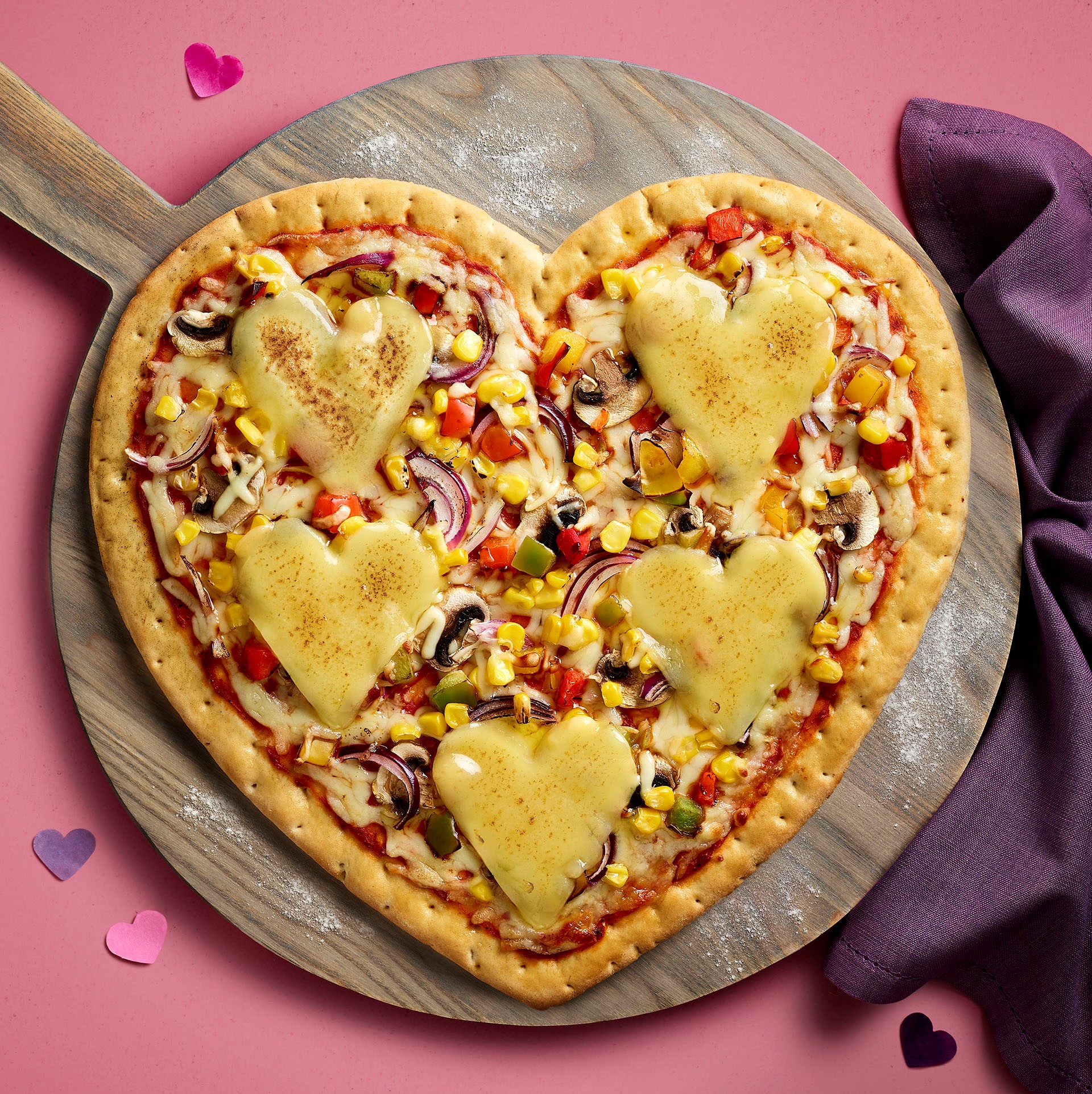 Pizza en forme de coeur.